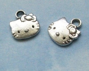 10 Hello Kitty charms, silver tone, 13mm