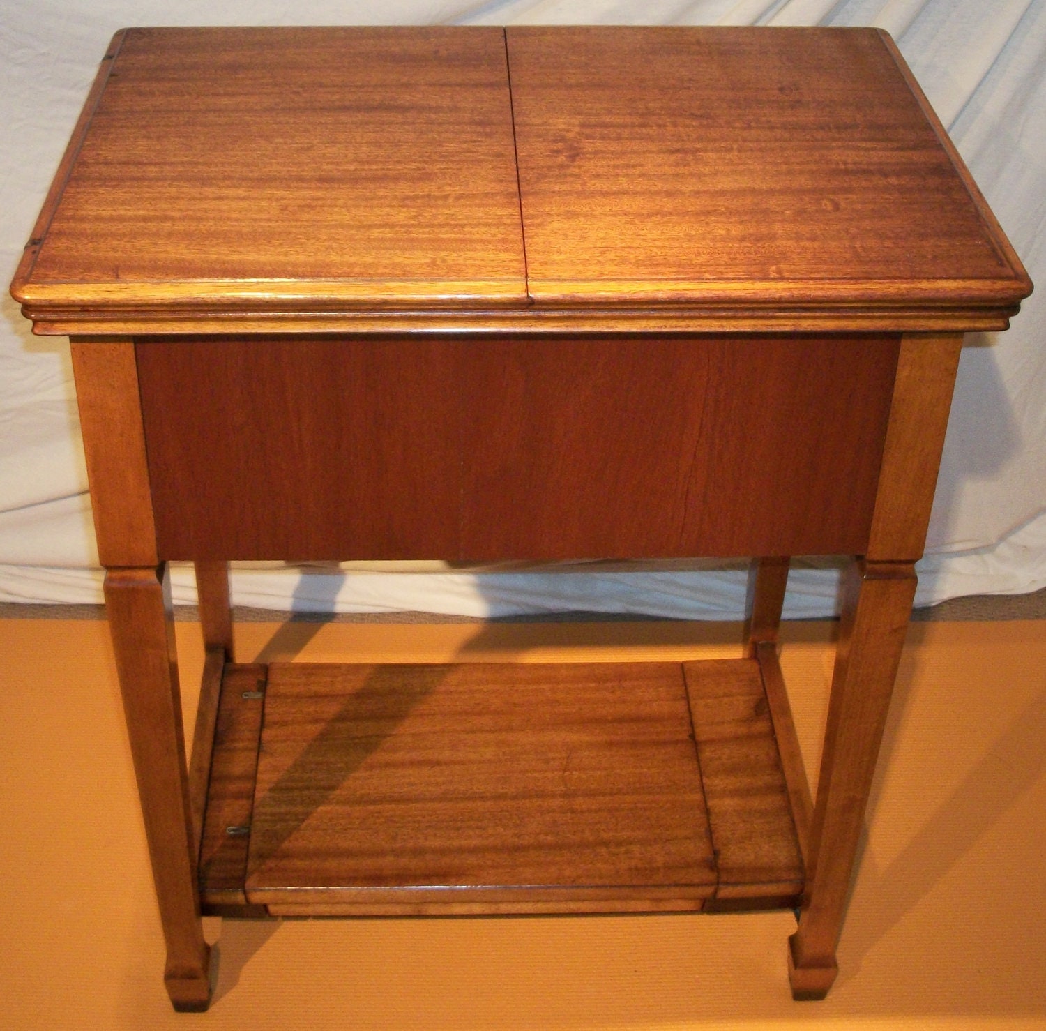 Singer sewing machine deluxe library table