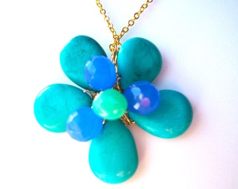 Flower pendant necklace wire wrapped with turquoise, chrysophrase and blue faceted briolettes