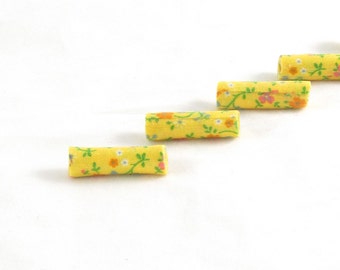 Fabric Beads Handmade Textile Fiber Bugle Beads Yellow Beads with Orange and White Flowers Green Leaves on a Bright Yellow Background