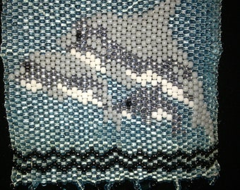 Beaded dolphin amulet bag