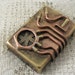 Steampunk modified Zippo windproof lighter. Made with brass, copper and vintage watch parts.