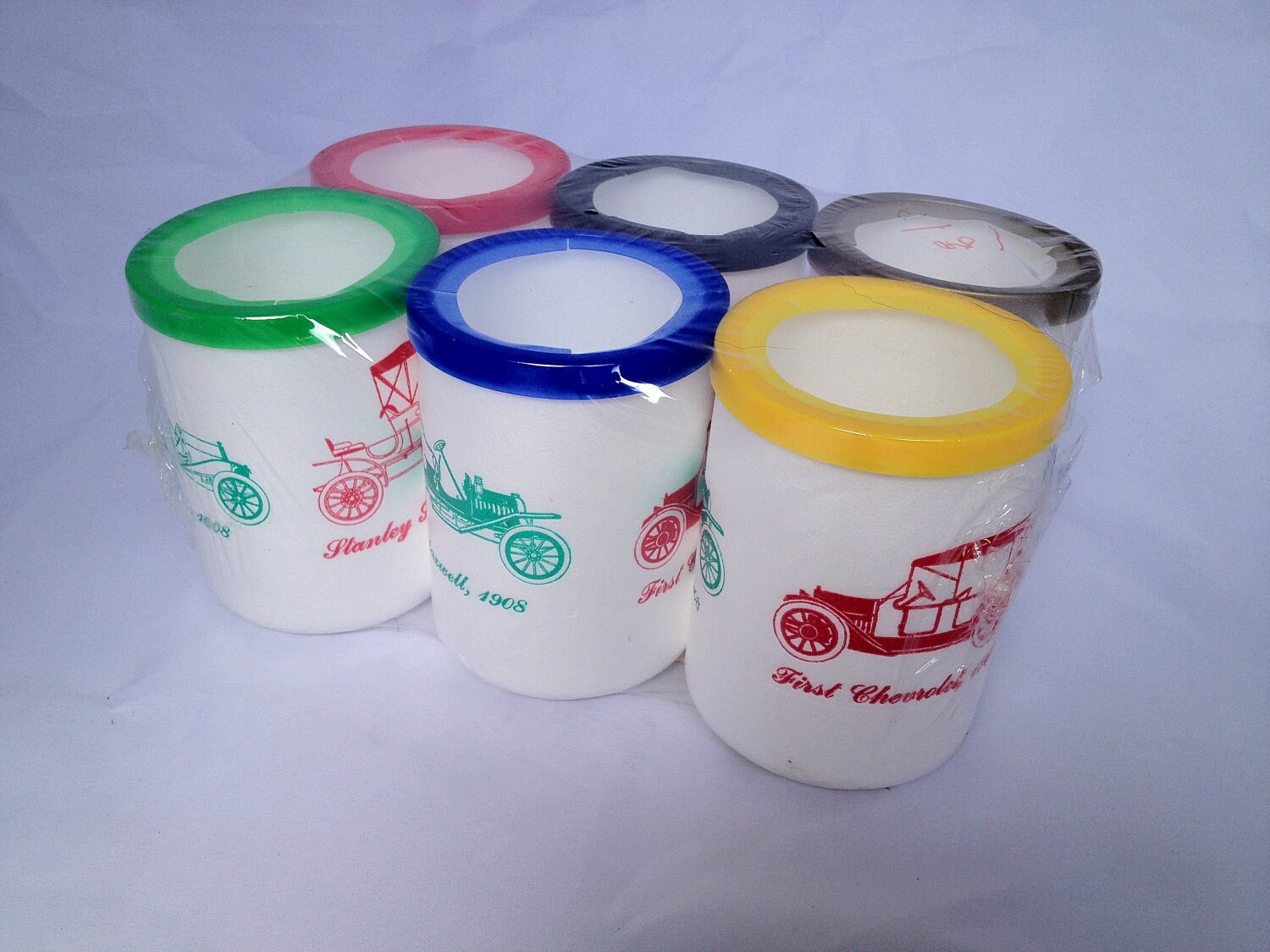 vintage 70's styrofoam can and bottle coolers featuring