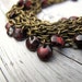 Multi Layered Bracelet, Antique Brass Chain with Red/ Black Czech Glass Coins: Singed Confetti