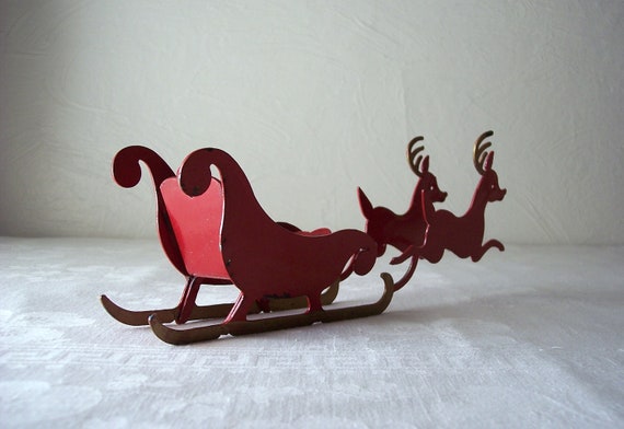 vintage red metal santa sleigh with reindeer by allthebestvintage