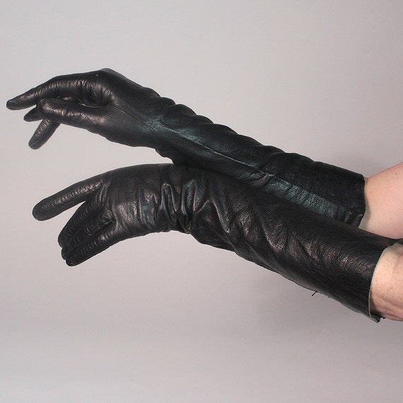 Elbow length black kid gloves. French kid leather. 1930's