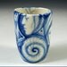 reserve for jennibram Little blue and white porcelain painted shot glass with faces