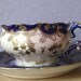 antique blue mustache tea cup and saucer set, Limoges France, gold white flowers, victorian era