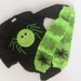 Black halloween spider one piece bodysuit and lime green baby leg warmers with spider