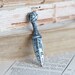 Tiny Weenie Silvery dagger with Ailien Writting