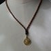 SALE Buddha necklace with garnets and aromatic sandalwood beads / yoga necklace 20" / vintage Thai temple amulet