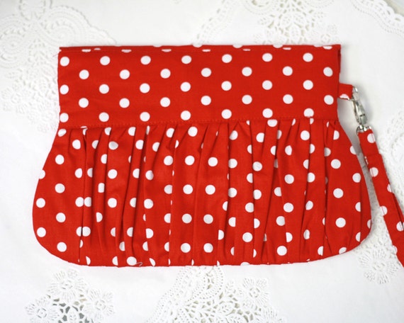 red and white clutch bag