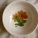 5.5" diam/2" tall 70's Franciscan "Floral" Pattern hand decorated earthenware small fruit/dessert bowl/ orange flowers,/green ring/leaves