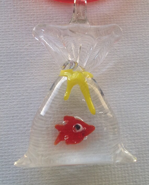 Items similar to Unusual Glass Fish Necklace / Fish in a Bag ) on Etsy