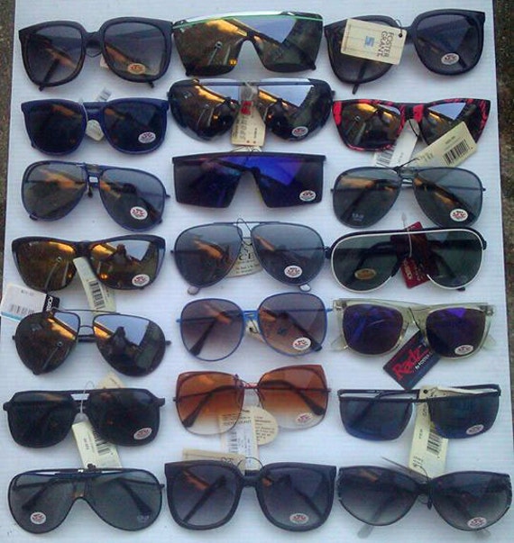21 Vintage name brand sunglasses 70s and 80s era all in new