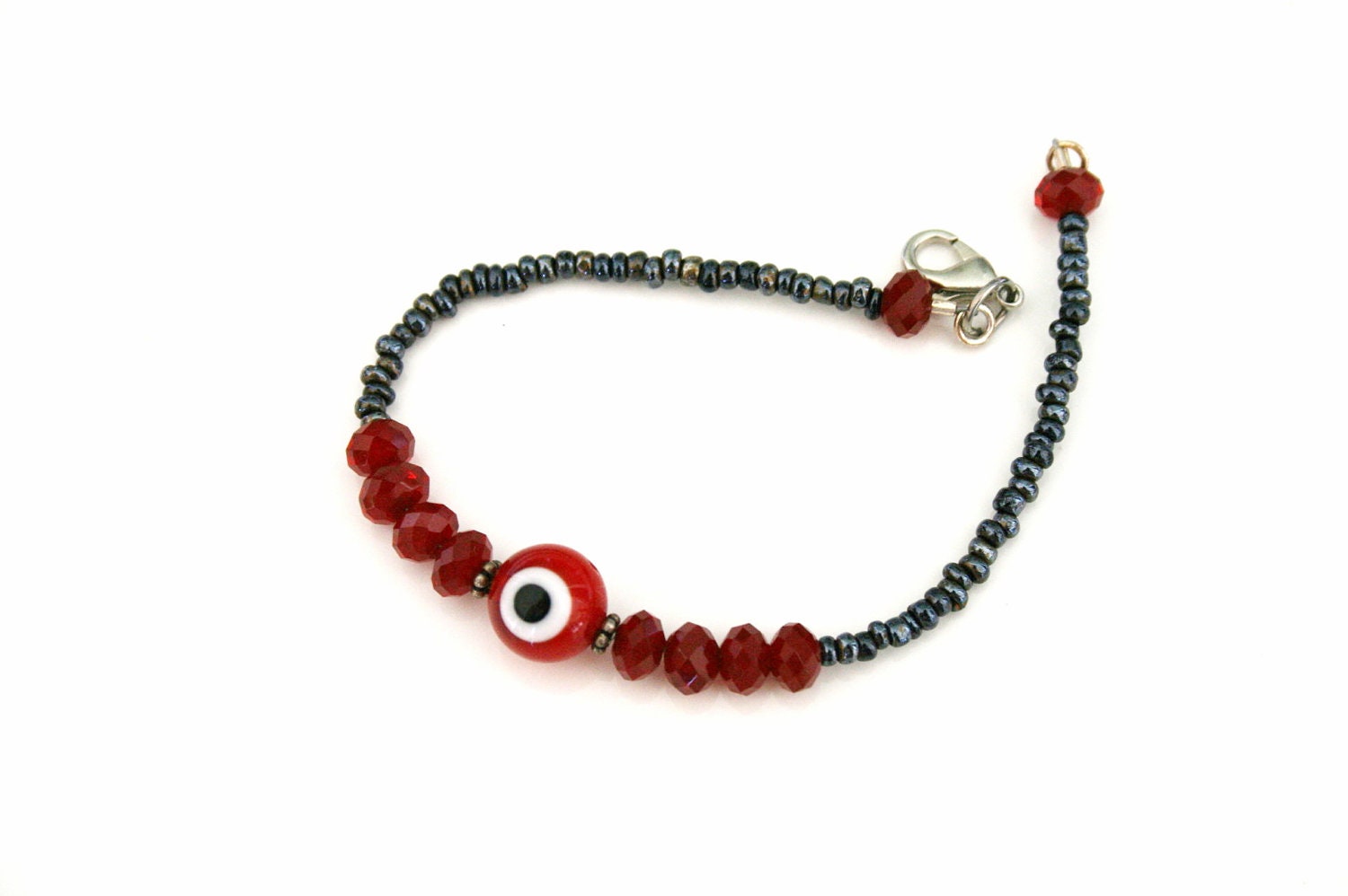 Red Ojo Bracelet Meaning