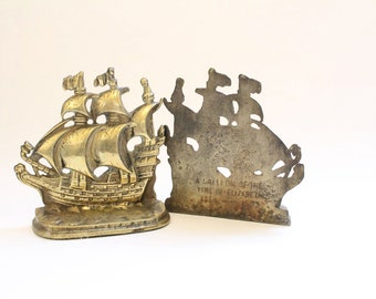 midsentury wooden bookends with ship