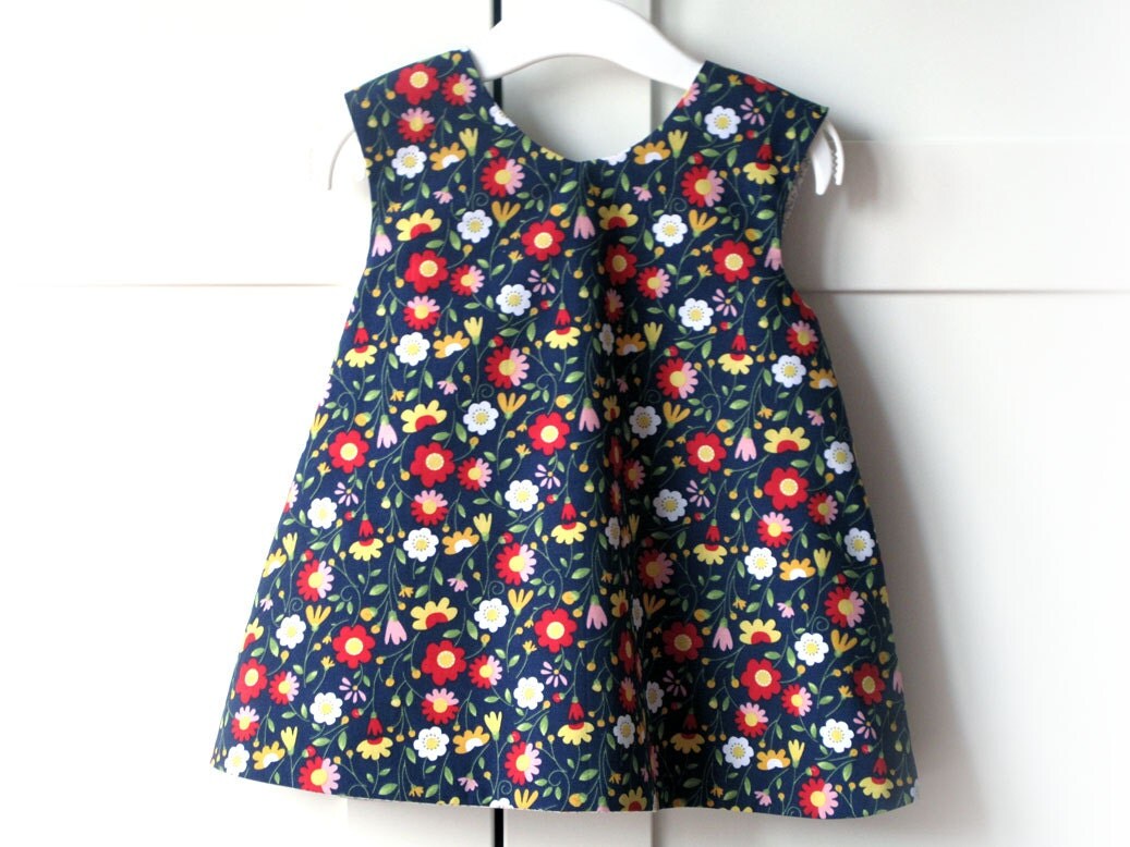 Reversible pinafore for baby girl toddler criss-cross apron