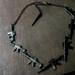 reduced - machine gun black statement necklace over the top chain necklace
