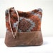 Native Vintage Carpet and Brown Leather Pouch