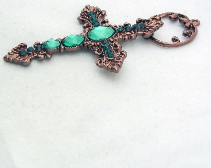 Copper-tone Cross with Emerald Green Rhinestones and Acrylic Faceted Gems