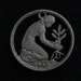 1950 Germany - cut coin pendant/charm - w/ Woman Planting Oak Tree Sapling