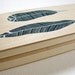 two feathers. handpainted wooden box. nature inspired art objects by natasha newton