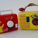 2 vintage sesame street toy radio and ambi toys radio by GarageInc