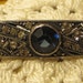 Vintage Sterling and Rhinestone Bar Pin Blue Faceted Center