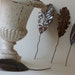 four vintage rusty tin leaves