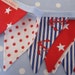 Small Classic Children's Bunting. Fabric Patterns - Stars, Spots and Anchors. Colours - Red, Royal Blue and white.