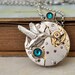 ENCHANTED FOREST steampunk watch movement necklace with humming bird and Swarovski rhinestones