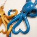 Intertwined Octopi in love Necklace, gold and peacock blue