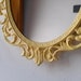 Pale Yellow Oval Princess Mirror in Ornate 10 by 7 Inch Vintage Metal Filigree Frame
