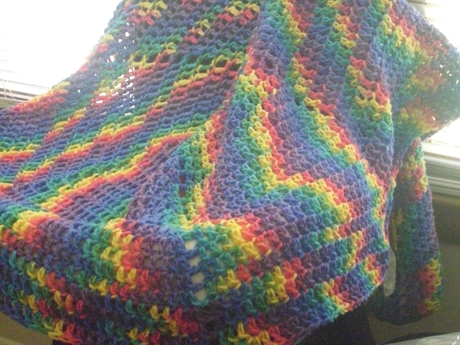 Crocheted circular tie dye blanket