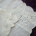Set of two hand embroidered napkins from 1950s in off-white llinen