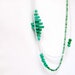 double strand geometric architectural necklace with green polygons