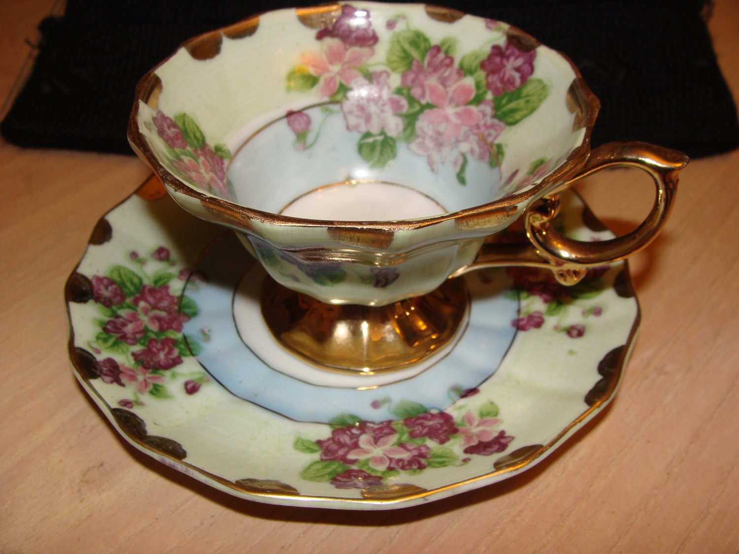 Lefton China Cup and Saucer Hand painted flowers gold trim
