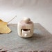 Miniature cabinet with a cute little bird, wood carving