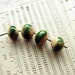 The green flash - a set of 4 ceramic art beads in crackled green and glossy clear