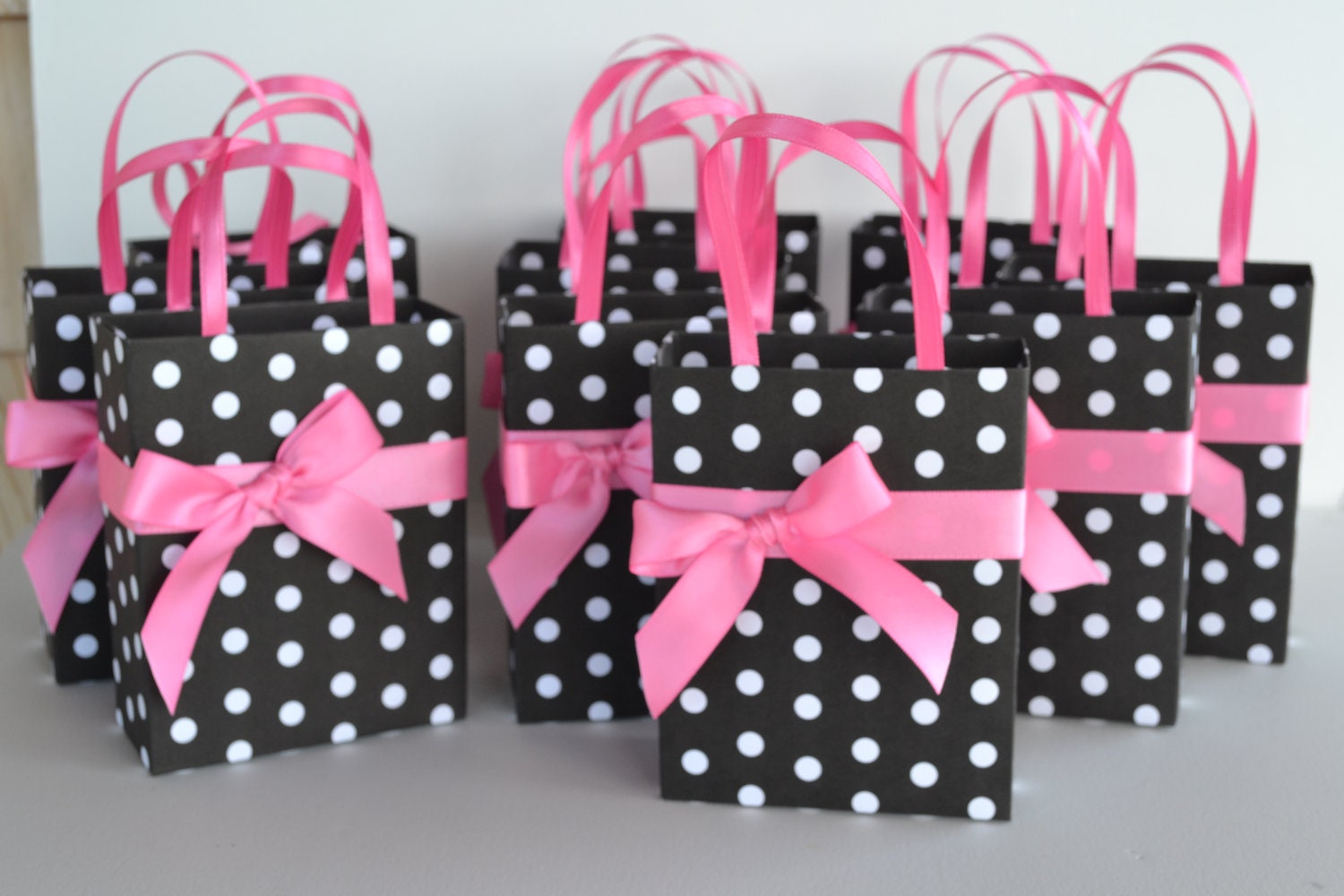 Pink and black and white polka dot party favor gift bag