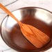 Large wooden spatula for flipping carved from salvaged Apple wood.