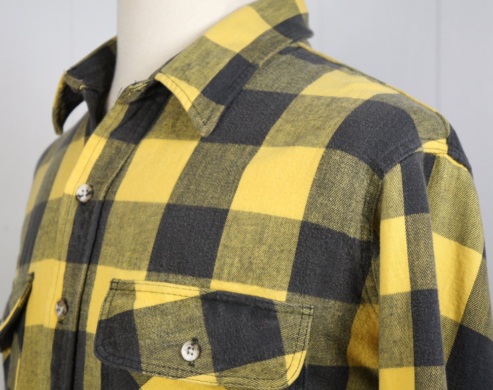 gold and black plaid flannel shirt