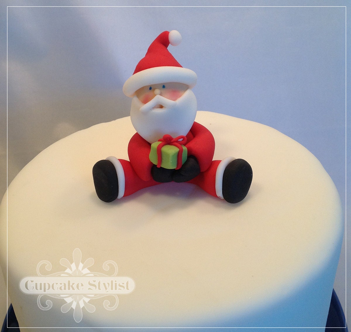 Fondant Santa Claus Cake and Cupcake Topper