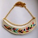 RESERVED Embroidered necklace multicolored laurel leaf design on a gold chain with toggle
