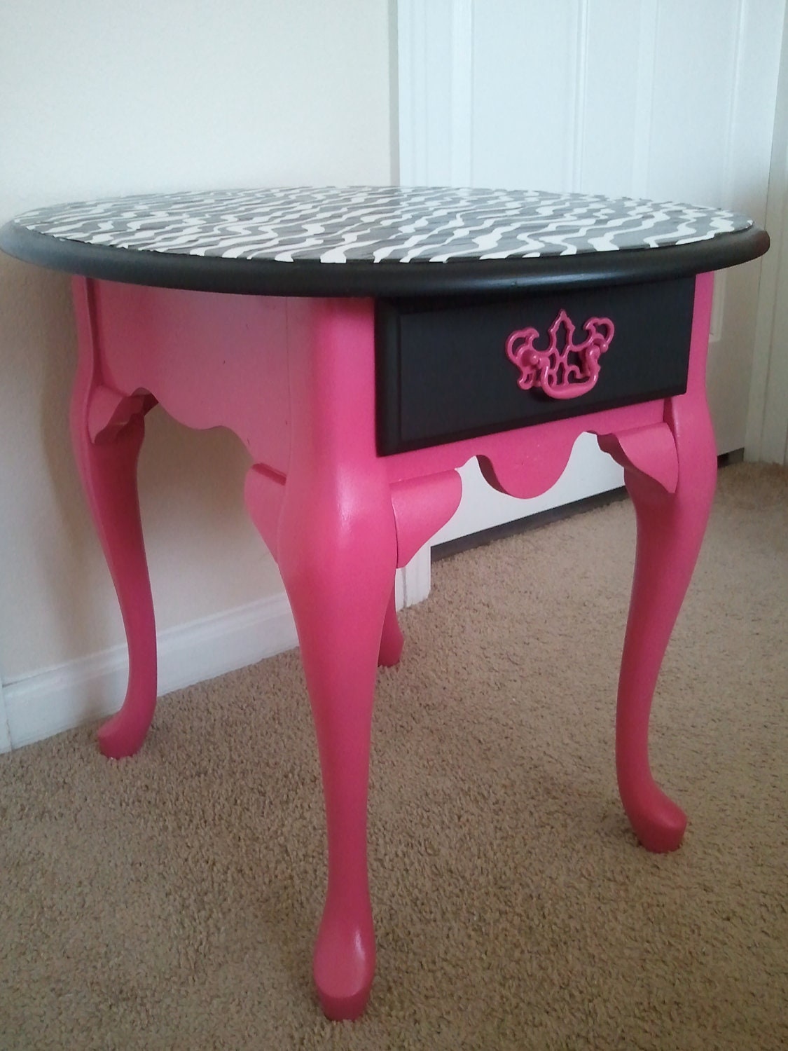 hot pink and black and zebra print accent table