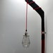 Vintage Hockey Stick Cage Light - red cloth twisted cord, wall mount, plug-in