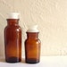 Pair of Brown Amber Glass Apothecary Jars with Lids - SALE PRICE