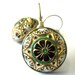 Vintage glass floral earrings. Black glass with green, gold, & white