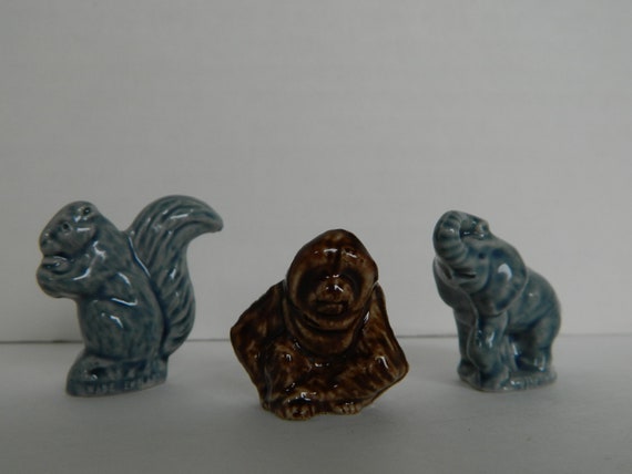 red rose tea figurines squirrel